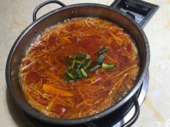 -黄利砖万峰林布依特色酸笋牛肉馆