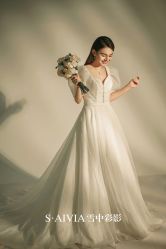 -雪中彩影婚纱摄影·微光艺术中心