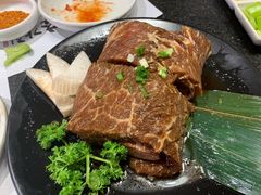 -草家酱蟹炭火烤肉店(珲春南路一店)