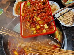 -明何记涮牛肚(品牌首店隋唐植物园南门古城路店)