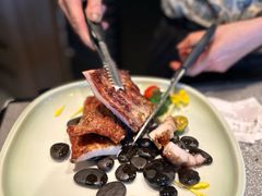 火焰黑毛猪颈肉-蕉叶·广州明星泰国菜(黑金冠保利广场店)