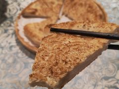 馕坑芝麻馕-巴扎美食·新疆菜·西域歌舞表演餐厅(新疆大厦店)