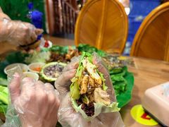 -沐毫傣泐云南菜孔雀宴•手抓饭傣味烧烤(曼听公园店)