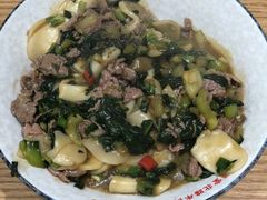 鲜牛肉炒年糕-经堂北路牛肉干面·溪口蒋永峰牛肉馆(宁波店)