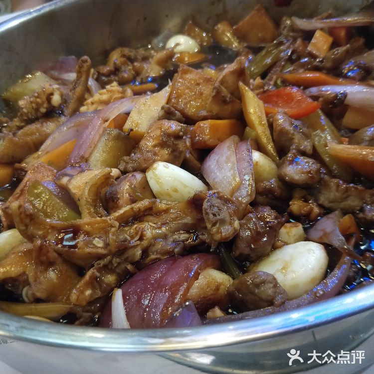 第一次焖锅是黄记煌，配着能吃三碗米饭