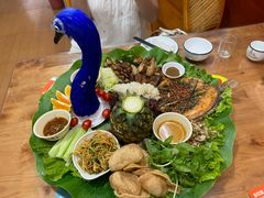-沐毫傣泐云南菜孔雀宴•手抓饭傣味烧烤(曼听公园店)