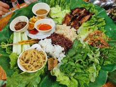 -沐毫傣泐云南菜孔雀宴•手抓饭傣味烧烤(曼听公园店)