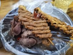 -梁老三麻辣鸡头总店