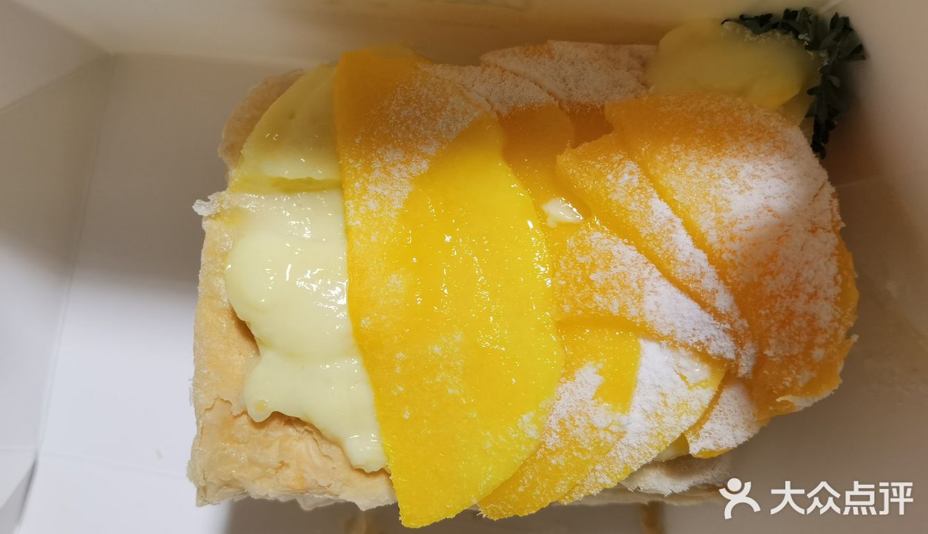 开在了长宁中山公园附近的龙之梦商场的港丽餐厅门口
