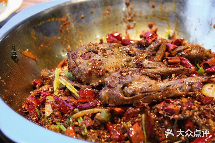 安诚居干锅鸭头(八角店)爆辣干锅鸭头图片