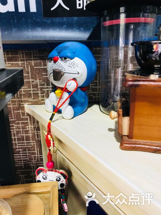 大眼萌动漫奶茶店图片