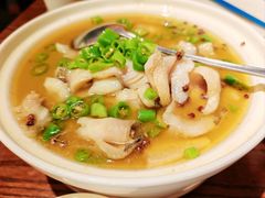 酸汤煮嫩滑鱼片-小大董·烤鸭(王府井apm店)