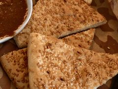 招牌龟兹芝麻胡饼-龟兹KUCINA·新疆菜(前滩L+PLAZA店)