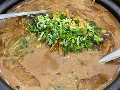 招牌秘制鱼头砂锅-老大同酒家·糟卤·本帮菜(中山公园店)