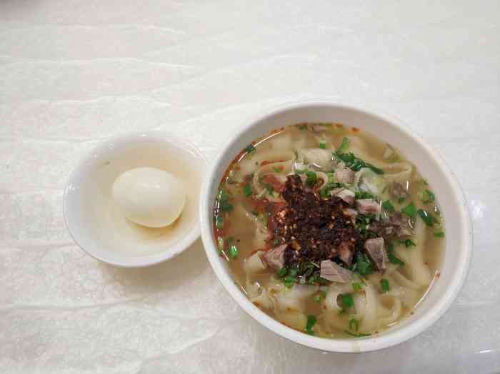 香丁丁牛肉面(连锁总店)-"体验吴忠早茶文化～ 水煎包和锅贴好吃,酸.