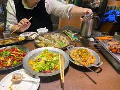 -曼听小寨海鲜烧烤·大连辣炒大王(盖州街店)