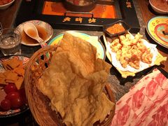 -老牌坊云南鱼豆花火锅(哈西万达店)