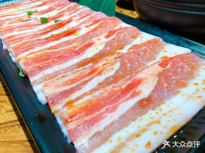 九田家黑牛果木烤肉料理(万达cbd店)调味猪五花图片 - 第1张