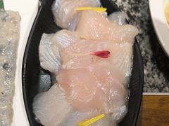 -老牌坊云南鱼豆花火锅(哈西万达店)