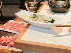 -老牌坊云南鱼豆花火锅(哈西万达店)