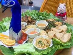 -沐毫傣泐云南菜孔雀宴•手抓饭傣味烧烤(曼听公园店)