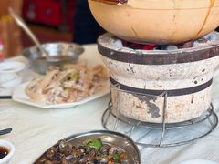 炒田螺-广宁炭炉鸡煲·富临门饭店