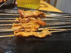 -明何记涮牛肚(品牌首店隋唐植物园南门古城路店)