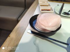 腌萝卜片-猪啊牛呀羊啊铜盘烤肉(正大广场店)