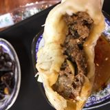 包子粥卤蛋 咸菜 一路走过去齐了