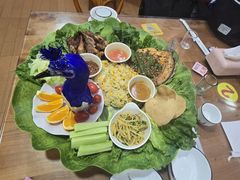 -沐毫傣泐云南菜孔雀宴•手抓饭傣味烧烤(曼听公园店)