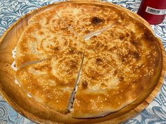馕坑芝麻馕-巴扎美食·新疆菜·西域歌舞表演餐厅(新疆大厦店)