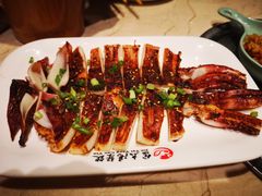 烤鱿鱼-金太阳海鲜烧烤·本地人餐厅(星海公园店)