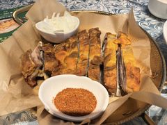 馕坑果木烤羊排-巴扎美食·新疆菜·西域歌舞表演餐厅(新疆大厦店)