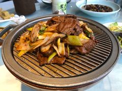 经典葱爆小羔羊肉-悦融·京鲁菜·露台花园(安定门店)