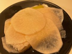 腌萝卜片-猪啊牛呀羊啊铜盘烤肉(正大广场店)