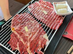 铺天盖地火牛寿司（2枚）-仙隐小鹿中华料理(南宁万象城店)