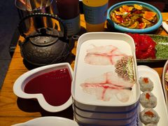 -老牌坊云南鱼豆花火锅(哈西万达店)