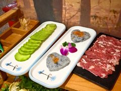 -明何记涮牛肚(品牌首店隋唐植物园南门古城路店)