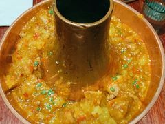 土司铜锅油焖鸡-浩海火烧云傣家菜(京广店)