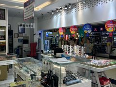 -美式眼镜·授权蔡司.依视路.尼康.豪雅.明月(人民广场店)