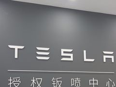 -北亚国超特斯拉授权钣喷中心