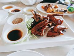 手撕招牌炸乳鸽-海宁铂尔曼酒店紫荆中餐厅