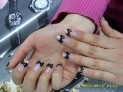 6,4黑色蝴蝶结-星美甲
