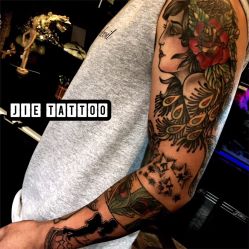 帅哥的NewSchool花臂 表达的含义是妻子和孩子 满满的都是爱 纹身师：杰Tattoo刺青主理人 TianJinChina中国天津-杰TATTOO刺青