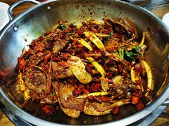 爆辣干锅鸭头-安诚居干锅鸭头(八角店)