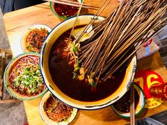 -拈签一笑黄牛肉辣卤串串