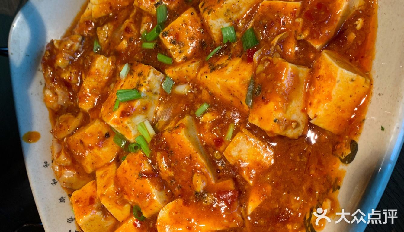 肖四女乐山跷脚牛肉(无锡首店)饼很好吃，脆香