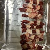 串成串，撒盐，孜然粉，辣椒粉，孜然粒，烤箱200度