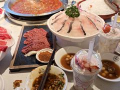 -茅草房·河畔园林火锅