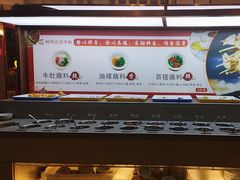 -明何记涮牛肚(品牌首店隋唐植物园南门古城路店)